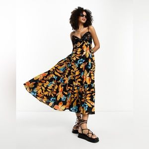 River Island tiered maxi beach dress in black tropical print
